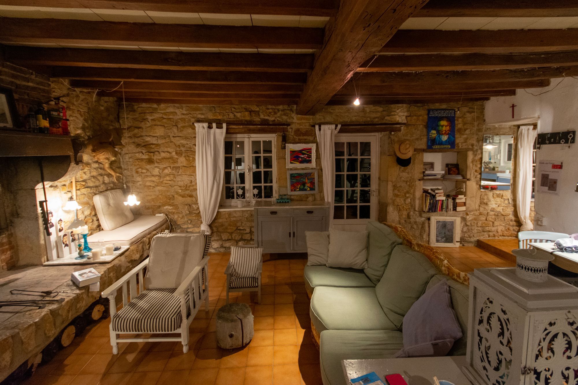 The beamed sitting room with its old stone walls