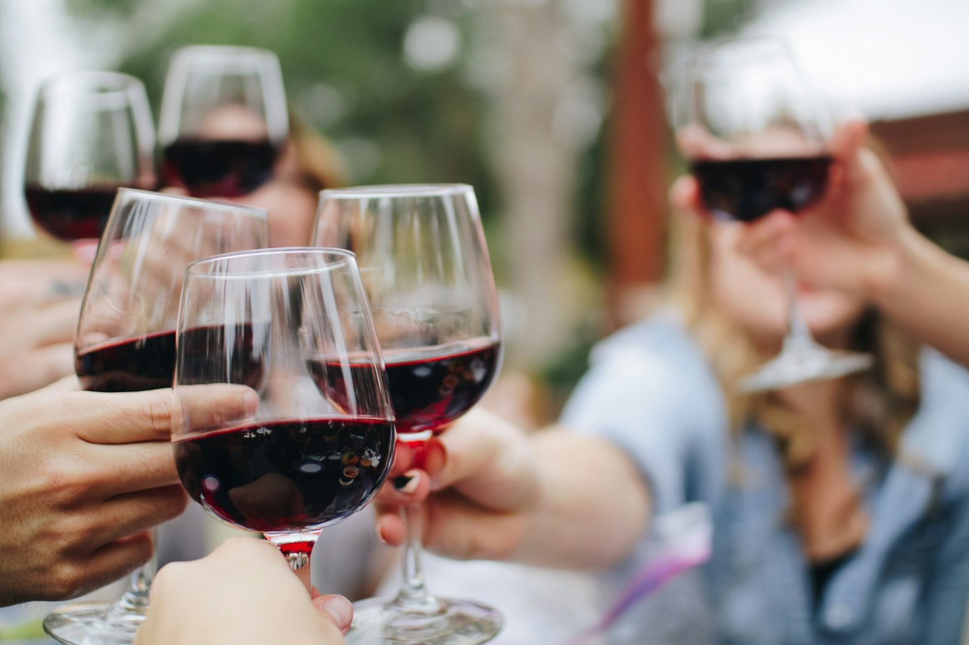 Glasses raised at a pub table